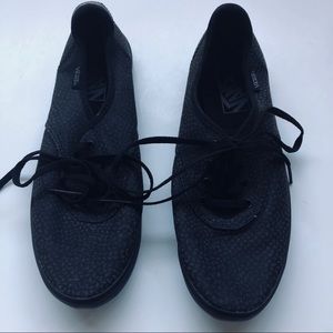 Woman’s Vans off The Wall Black Tan Sneakers 7.5